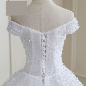 Vestido de Noiva Luxuoso com Pérolas - Elegância e Sofisticação